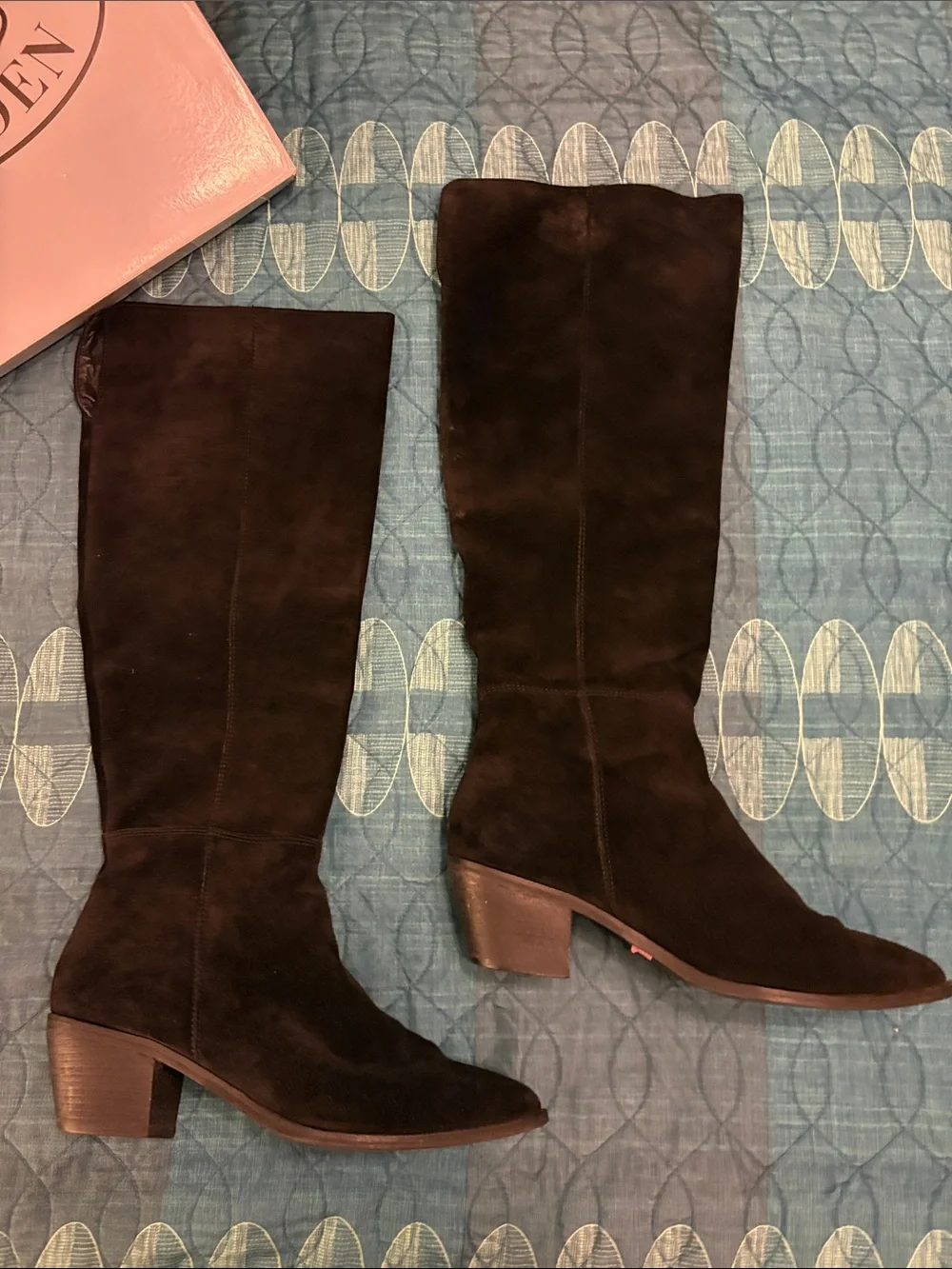 Black suede boots. Nothing more. Nothing less. Over the knee.